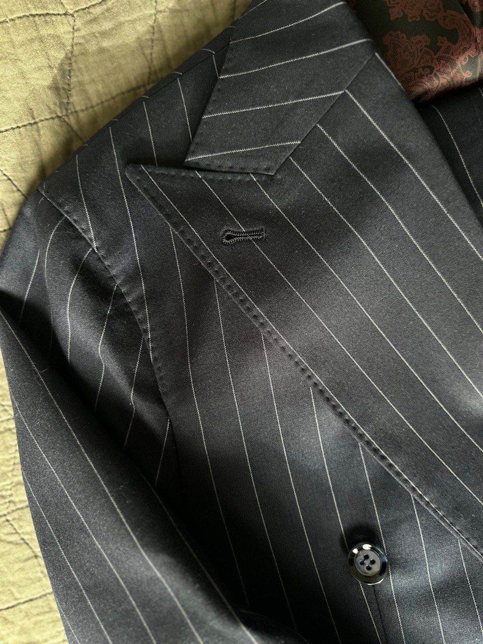 Black pinstripe custom suit lapel detail